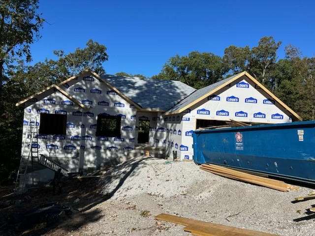 Secure this beautiful new construction by Elite Thomas Homes early to lock in current pricing and personalize select finishes and upgrades. Construction is underway with framing complete and an estimated completion date of mid-January 2026. Ideally located on the east side of Bella Vista near Lake Windsor, the property backs to the Tunnel Vision bike trail, offering direct access to the trail system just off Hampton. Inside, youāll find an open-concept layout with vaulted ceilings accented by beams, a stack-stone vent-free gas fireplace, and wood flooring throughout the main living areas, hallways, and the primary bedroom (including the closet). The split floor plan offers privacy, with bedrooms 2 and 3 finished in carpet. The primary suite features a spacious bath with dual vanities, a large tiled shower with two shower heads, and a linen closet. Enjoy outdoor living on the covered deck just off the kitchen, perfect for morning coffee. Contact me for a full list of finishes and available upgrades.