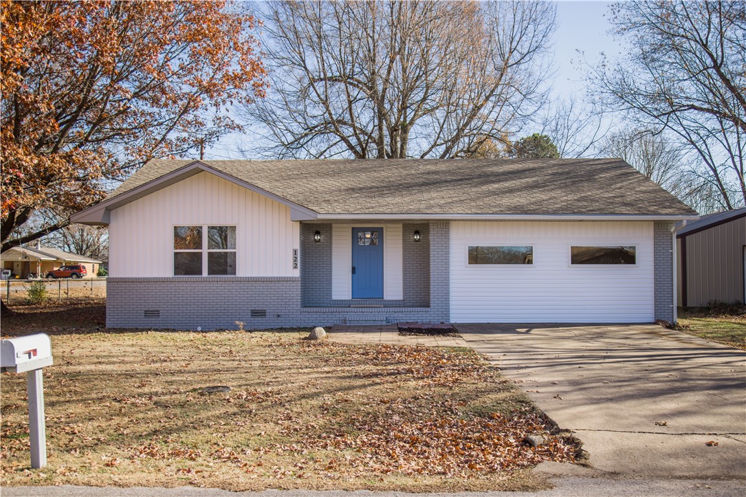 Your home search is over! This beautiful 3 bed, 2 bath home has been completely remodeled. You are walking distance from Prairie Grove schools, restaurants, shopping, & everything Historic Downtown Prairie Grove has to offer. Interior features: new vinyl flooring throughout entire home, granite countertops, new vinyl windows, split floor plan, custom built cabinets, new matching appliances, custom built mudroom bench, & so much more! The bonus room/extra living room/office is heated and cooled by a new mini split system. Home also has a brand new HVAC system, new ductwork, & updated wiring with new breaker box. Exterior features: beautiful painted brick, new vinyl siding, huge back yard, great back patio for entertaining, 8X12 storage building, & a nice 24X30 shop with electric. Shop could be used as a garage too. Don’t wait, schedule a showing today!