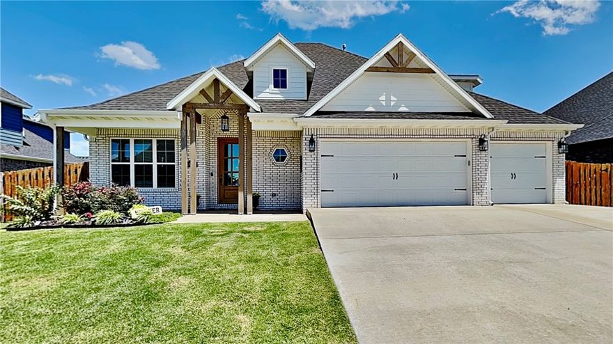 Welcome to this stunning 4-bed, 2.5-bath home in the heart of Pea Ridge. With 2,485 sqft this house offers an open layout, perfect for modern living. Step inside to a large entry with a built-in bench, leading to an airy living room. The open kitchen is a chef's dream, featuring a generous island, huge hidden pantry, and soft-close cabinets. Enjoy luxurious touches like granite countertops, shiplap accents, and beautiful new wood look tile and carpet. This home boasts a cozy gas log fireplace and abundant storage with walk-in closets. Beyond, a covered patio and pergola extends your living space, ideal for unwinding in your private hot tub (only 2 years old). Plus, enjoy energy efficiency and savings thanks to the solar panels! With a 3-car attached garage and a durable brick exterior, this property combines convenience with classic appeal. An attractive storage building ensures you have room for all of your toys! View the virtual tour and walk the property from your computer then make an appt to see it in person!