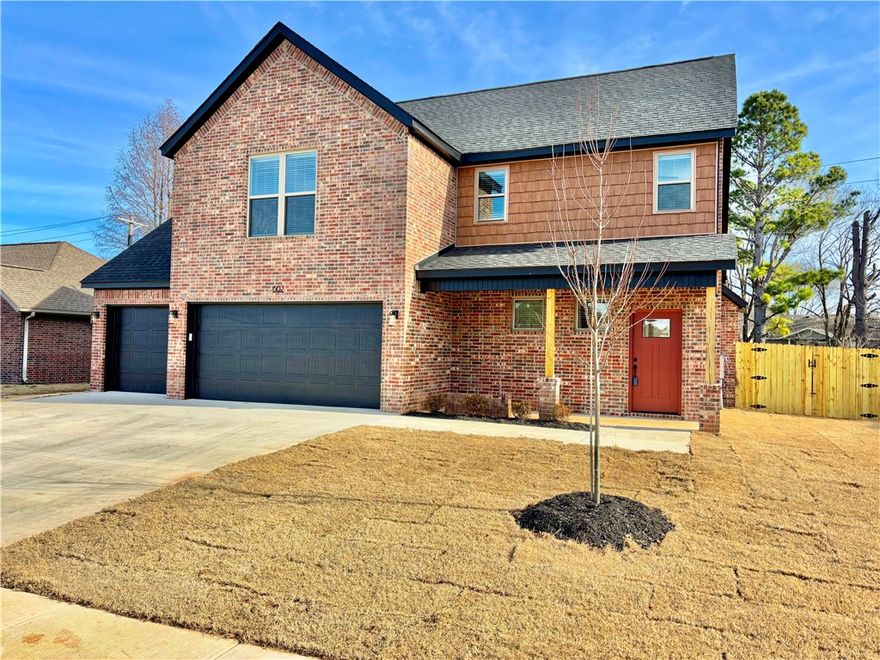 Exceptional new construction in the heart of booming Pea Ridge. This 4-bedroom, 3.5-bath residence showcases elevated craftsmanship and a modern design. Crafted with attention to detail, this home highlights a linear fireplace, LED lighting, and elegant finishes throughout. The split floor plan includes two primary suites, offering flexibility. The kitchen is a showpiece with granite countertops, quality cabinetry, and a seamless flow ideal for entertaining. Thoughtful touches continue with walk-in closets, ample attic storage, and a brick-and-vinyl exterior that blends style with lasting durability. Set in one of Northwest Arkansas’s fastest-growing areas, this home combines modern luxury with everyday comfort — a truly standout property in Pea Ridge.