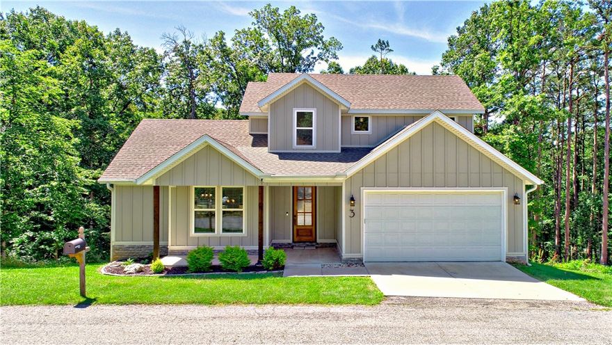 Move In Ready! Very lightly occupied as a second home for the last 2.5 years. This beautifully appointed home features soaring high ceilings throughout, a wonderful Great Room streaming with natural light, hardwood floors, crown molding, expansive custom deck for entertaining, birdwatching, and enjoying your morning coffee. Efficient, rare 4 bedroom, 2/1 bath design features a spacious Primary bedroom/bath on the main level and 3 bedrooms/bath and study nook upstairs. All the new home add-ons have been taken care of--custom blinds, gutter guards, insulated garage door, established landscaping. Conveniently located in a coveted neighborhood of new and established homes on a sewer lot. Only 19 minutes to Walmart Home Office and only 3-min. by bike to the Back 40 trail entrance, 5 min. to Harps, 7 min to Walmart. Fast access to Bella Vista's resort-like amenities: 150 miles of world-class bike and hike trails, 6 recreational lakes, 6 golf courses, Rec Centers, Pools, Tennis, Picketball and more. Bentonville Schools!