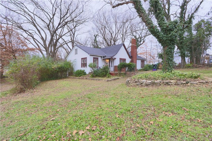 $1,200 preferred lender credit to help with your closing cost if needed. This 4-bedroom, 2-bath charmer offers the character of an older home along with the kind of features and location that make everyday living easy. Sitting in an area zoned for both residential and commercial use, this property offers wonderful flexibility.

Inside you'll find two inviting living spaces: a welcoming main living room plus a comfortable den off the kitchen. The kitchen and common areas flow easily, and the washer, dryer, and refrigerator all convey, making move-in simple.

Outside, a cute back patio is shaded by mature pecan and magnolia trees. Enjoy being just a short stroll from local restaurants, the city playground, pool, tennis courts, and the highly anticipated new library.

With a brand-new roof, curb appeal, and a location that puts you right in the heart of the community, this home offers a rare blend of character and convenience. Come see what makes it so special!