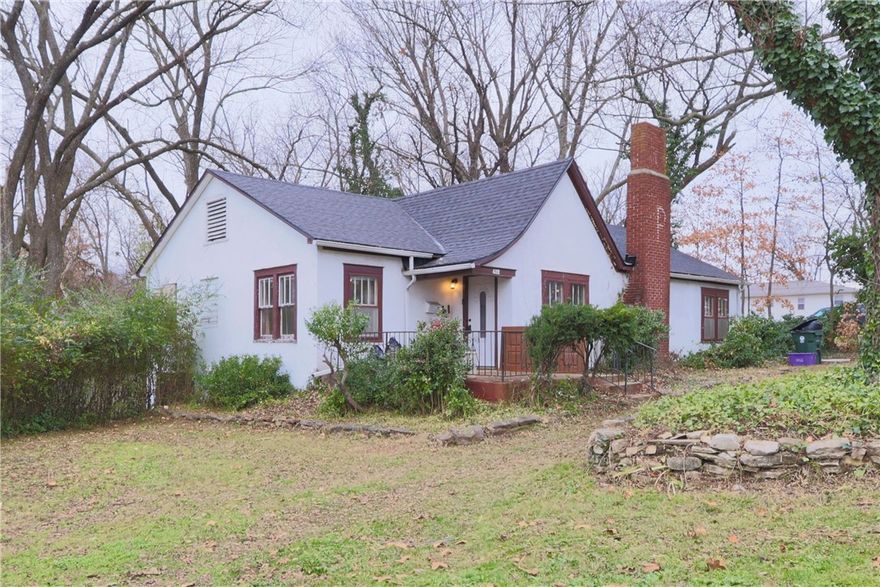 This 4-bedroom, 2-bath charmer offers the character of an older home along with the kind of features and location that make everyday living easy. Sitting in an area zoned for both residential and commercial use, this property offers wonderful flexibility.

Inside you'll find two inviting living spaces: a welcoming main living room plus a comfortable den off the kitchen. The kitchen and common areas flow easily, and the washer, dryer, and refrigerator all convey, making move-in simple.

Outside, a cute back patio is shaded by mature pecan and magnolia trees. Enjoy being just a short stroll from local restaurants, the city playground, pool, tennis courts, and the highly anticipated new library.

With a brand-new roof, curb appeal, and a location that puts you right in the heart of the community, this home offers a rare blend of character and convenience. Come see what makes it so special!