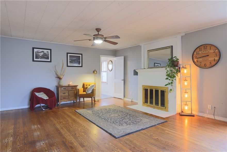 This 4-bedroom, 2-bath charmer offers the character of an older home along with the kind of features and location that make everyday living easy. Sitting in an area zoned for both residential and commercial use, this property offers wonderful flexibility.

Inside you'll find two inviting living spaces: a welcoming main living room plus a comfortable den off the kitchen. The kitchen and common areas flow easily, and the washer, dryer, and refrigerator all convey, making move-in simple.

Outside, a cute back patio is shaded by mature pecan and magnolia trees. Enjoy being just a short stroll from local restaurants, the city playground, pool, tennis courts, and the highly anticipated new library.

With a brand-new roof, curb appeal, and a location that puts you right in the heart of the community, this home offers a rare blend of character and convenience. Come see what makes it so special!