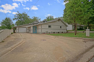 Space, space, and MORE SPACE!! That is exactly what you will find in this remodeled 2700+ SF stucco home right in the heart of Atkins. Open the doors to this home and find beautiful new laminate hardwood floors in the large living room, a great open kitchen/dining area, three or four bedrooms, three full bathrooms and even an expansive bonus room that can be home to so many different things.