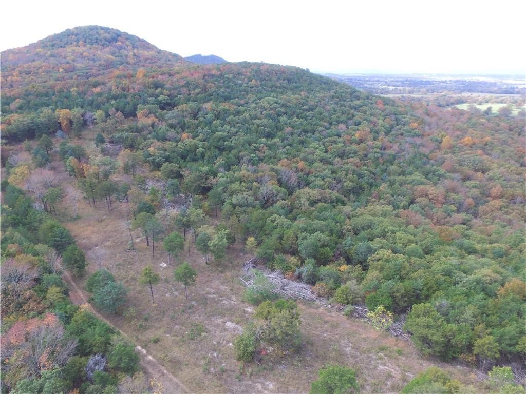 Very lightly restricted acreage close to town but private.
