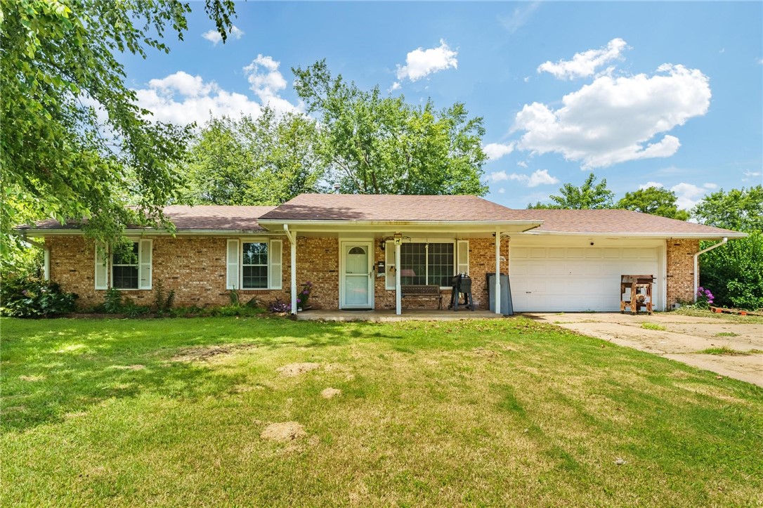Home features two added rooms in the garage space. The backyard boast a split area with one side dedicated to dogs and the other dedicated to lounge space. There is a gazebo on the lounge side as well as a chicken coop and a storage shed.