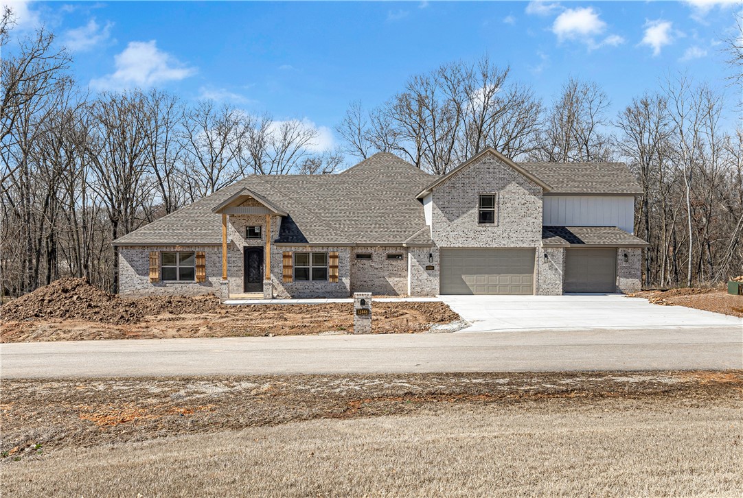 Stunning new construction! Lot 4 is Violet Plan: 3732 Sqft, 4 BDs, 3 1/2 BAs + OFFICE+BONUS on 1.02 Acres Lot! The main level features a split floor plan and includes an Office, open kitchen, dining, living area w/ fireplace, Master Suite, guest bedroom ensuite, 2 more bedrooms w/ walk-in closets & shared bathrooms. The kitchen is equipped with double ovens, custom cabinets, custom countertops, pot filler, bottle washer, gas range, vent hood, & a large walk-in pantry. Upstairs is a spacious Bonus living area. Enjoy a scenic backyard with a gorgeous covered patio w/ its own built-in fireplace. Convenient to Beaver Lake w/ 17 mins to Prairie Creek Marina, 4 mins to Rogers Executive Airport, 11 mins to dwtn Rogers, 25 mins to Walmart H/O & 9 mins to Big Sugar Golf Club.
Home is being built on Hidden Forest PH1-Avoca w/ 37 lots. We have 3 available house plans: Magnolia 3084 Sqft, Bluebell 3430 Sqft, & Violet 3732 Sqft. Clients are able to customize homes upon requests. Come pick out your lots!