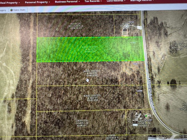 Mostly wooded 5 acres with open land along Hwy 62. Combo wildlife and country setting in one beautiful piece of land. Rural water tap is on property - Washington Water. You can build your house or tiny home on this property & enjoy country living. Prairie Grove schools. See 1309520 for add'l acreage.