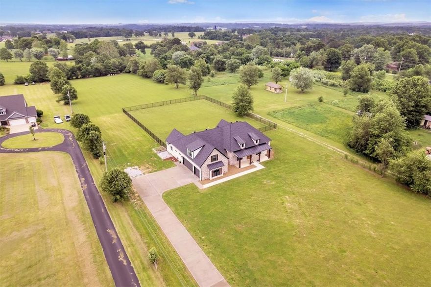 Custom built in 2021 by Baumann & Crosno Construction and designed by Lane Crosno.  3500 sqft sitting on a beautifull 1.72 acre lot in West Springdale with storm shelter and three car garage.  Four bedrooms, three full baths, hidden walk-in pantry, open kitchen/living layout and office/formal dining room. Custom cabinetry throughout, soft close drawers, ample storage space, multiple fireplaces, LED lighting, blinds included and upgraded appliances.  Spa like primary bathroom with walk-in glass shower doors and dual entrances, seperate dual vanities and closets and a stand alone soaking tub. Fourth bedroom and staircase have new carpet and garage has been freshly painted.