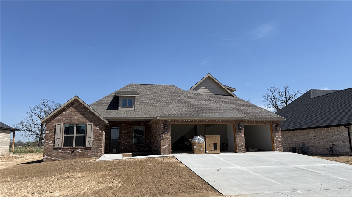Beautiful new 4 bedroom, 3 bath, 3 car garage home in the South Pointe Subdivision. 2500 sf including 2 bedrooms and bathroom upstairs. Open floor plan great for entertaining with a spacious covered back porch. Large master closet, large pantry, wired for security, fence, gutters and blinds included. Located in the Har-Ber High School district with easy access to I-49. 15 minute drive to Tyson World Headquarters. Get an additional up to $3000 if you use preferred lender.