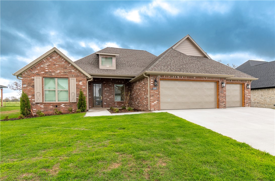 Beautiful new 4 bedroom, 3 bath, 3 car garage home in the South Pointe Subdivision. 2500 sf including 2 bedrooms and bathroom upstairs. Open floor plan great for entertaining with a spacious covered back porch. Large master closet, large pantry, wired for security, fence, gutters and blinds included. Located in the Har-Ber High School district with easy access to I-49. 15 minute drive to Tyson World Headquarters. Get an additional up to $3000 if you use preferred lender.