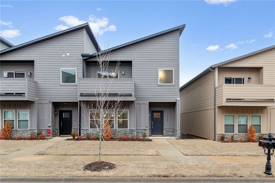 Gorgeous new construction townhome! Welcome to Timber Ridge Estates! This townhome is just minutes from the interstate and the University of Arkansas. This home has a gorgeous view from the upper balcony, granite counter tops, large closets, and a custom interior design! Perfect for AIR BNB, long term rental, or permanent residence, the split floor plan boasts 3 spacious bedrooms PLUS an office. Seller offering up to $10,000 in buyer concessions. Preferred lender offering up to $3500!  This one makes sense on paper! Let's make this one yours!
