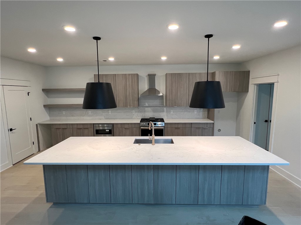 Brand new and perfectly located in South Fayetteville, this home offers easy access to trails, schools, and more. With rooftop terraces showcasing beautiful views, the home features a gas fireplace, built-in cabinets in the master suite, and a two-car garage with frosted glass doors. Inside, the open floor plan highlights hand-scraped hardwood floors, a sleek kitchen with granite countertops, stainless steel appliances, and a built-in pantry. The master suite is a true retreat with scenic views, a spa-like bathroom, and a spacious walk-in closet. Guest bedrooms offer plush carpeting, and the home is finished with custom landscaping and laundry hookups. This one won’t last long—come see it today!