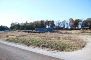 Commercial city lot located on state highway. Ready to build on. Great location with endless possibility.