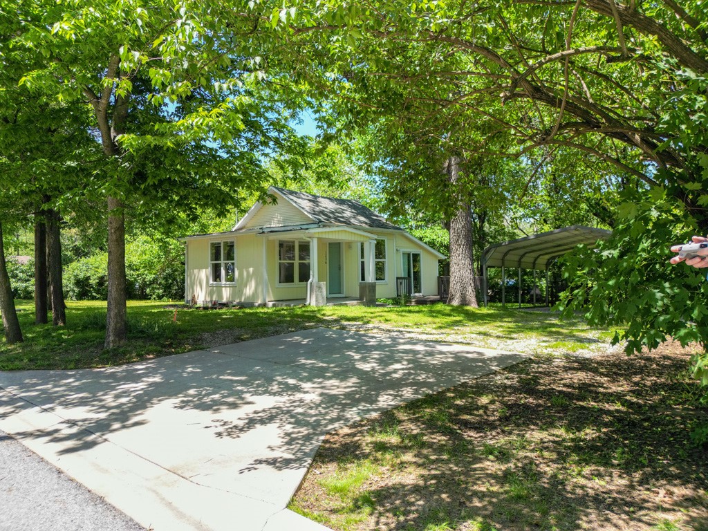 Zoned RI-U Move-In or Rent Ready Cute Home plus adjacent Lot at 1230 with separate Water Meter & Driveway ready to build. Located in an Opportunity Zone, this house and lot with beautiful mature trees is ideal for investors or future homeowners looking for long-term value and development opportunities.
Walk to UARK campus, catch the bus across the street, enjoy nearby amenities like Lewis Park, Harp’s Grocery, and a variety of restaurants—all in a quiet, established neighborhood. Lot at 1242 is also available see other listing. Surveys will convey.