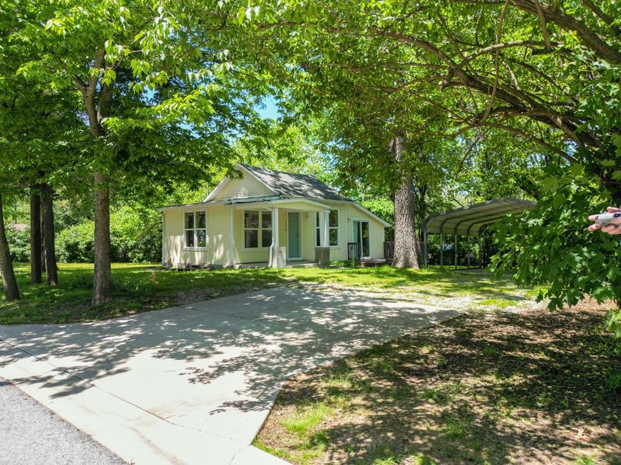 Zoned RI-U Move-In or Rent Ready Cute Home plus adjacent Lot at 1230 with separate Water Meter & Driveway ready to build. Located in an Opportunity Zone, this house and lot with beautiful mature trees is ideal for investors or future homeowners looking for long-term value and development opportunities. 
Walk to UARK campus, catch the bus across the street, enjoy nearby amenities like Lewis Park, Harp’s Grocery, and a variety of restaurants—all in a quiet, established neighborhood. Lot at 1242 is also available see other listing. Surveys will convey.