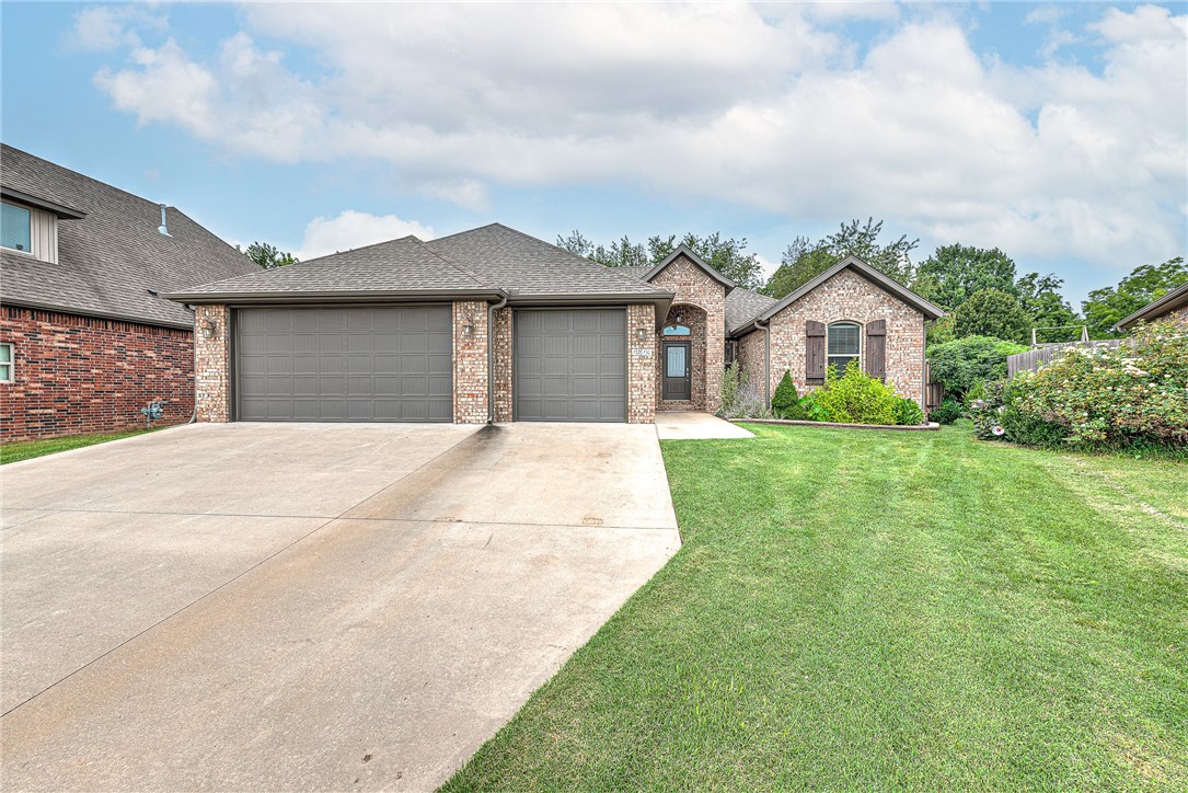 Welcome to this spacious and well-maintained 4-bedroom, 2-bath home offering approximately 2,153 sq ft of comfortable living space. The open floor plan is perfect for both everyday living and entertaining. The kitchen flows seamlessly into the living and dining areas and includes a refrigerator that conveys with the home. Just off the garage, you'll find a convenient combined laundry and mudroom, perfect for keeping things organized. The luxurious master suite features separate his-and-her closets, dual vanities, and a recently upgraded master shower with a sleek frameless clear glass door. Enjoy outdoor living with a spacious backyard that includes a mature pear tree, a raised garden bed, and a playset/swing set—all of which convey with the home. The 3-car garage has been upgraded with epoxy flooring for added durability and style. This home combines thoughtful upgrades with everyday functionality. Schedule your showing today!