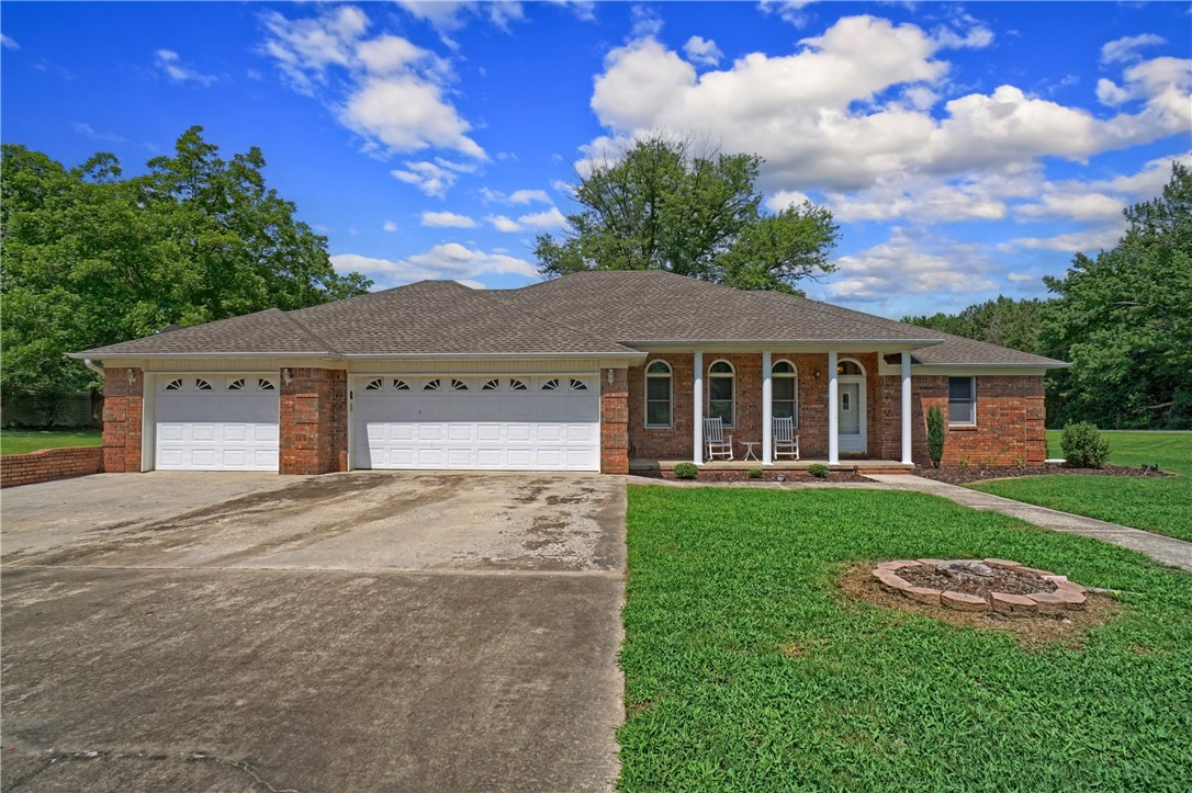 Welcome to 23 Fisher Lane—a spacious 2,537 SF brick home situated on 1.5 (+/-) serene acres just off Morgan Road, offering the perfect blend of country charm and convenience to both Dover and Russellville. This unique property features a flexible and functional layout that adapts effortlessly to your lifestyle. With three full bathrooms and three bedrooms—including a main suite that boasts two private baths (one with a walk-in shower, the other with a relaxing soaking tub)—everyone gets their own space to unwind. Need even more room? The additional bonus space is ideal for a fourth bedroom, home office, playroom, or creative studio. The layout offers endless possibilities, whether you're entertaining, working from home, or just need space to spread out. If you’re looking for comfort, versatility, and a peaceful setting within minutes of town, 23 Fisher Lane is ready to welcome you home.
