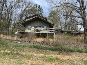 Need something with a lot of square footage for an extremely low price, this is it! There are certainly a lot of repairs to be done but once completed you could have a beautiful home for yourself. Or you may want to make it into a duplex or triplex for renting. This also has a huge 3 bay detached garage and another large shed on the property. This one will certainly go quick look today!