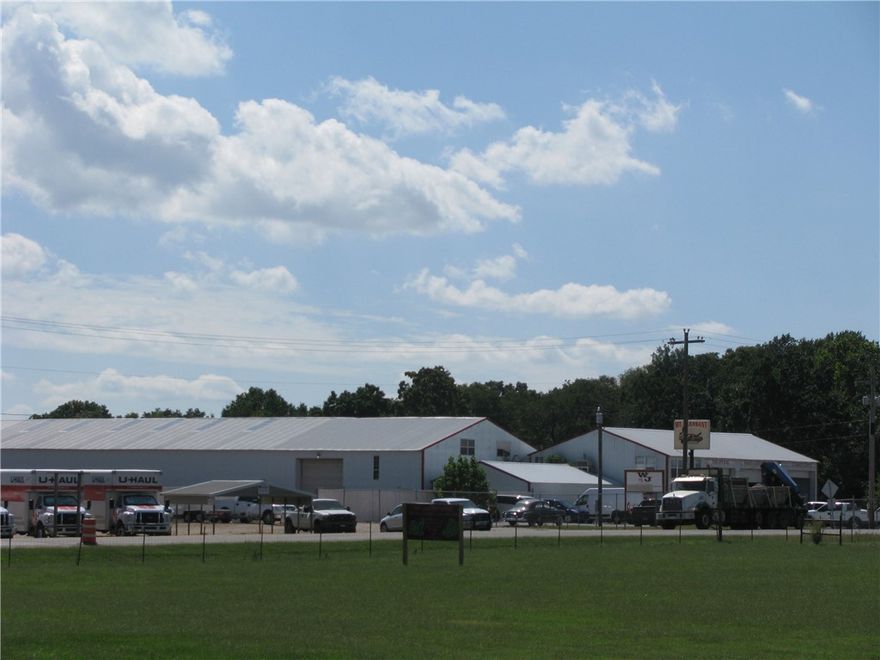 Prime commercial property ideally located off Interstate 49 and AR HWY 72. Endless development possibility's with this multi building facility to expand your footprint for additional development. This property includes 3 parcels totaling 11.70 acres in the City limits and is zoned Commercial C-2. Taxes reflect all 3 parcels. City of Gravette approved City Sewer anticipated early 2026. INVESTER'S, don't miss your opportunity in this growing area located across from the New Arkansas Welcome Center   (currently under construction ). Whether you're planning retail, mixed use or something unique, with easy access, HWY 72 frontage and Interstate 49 visibility, this property is exceptional. Daily traffic count on HWY 72 (11,000 ) Daily traffic count on US 49 North & South bound  ( 20,000). INVESTER'S, This Is A Must See location !!