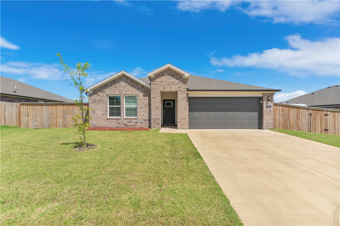 Beautiful home with 4 bedrooms, split floor plan, open kitchen with quartz countertops, spacious pantry, tons of windows for natural lighting, double vanity in master bath, spacious back yard with privacy fence, covered back porch, gutters, all brick exterior, and much more
