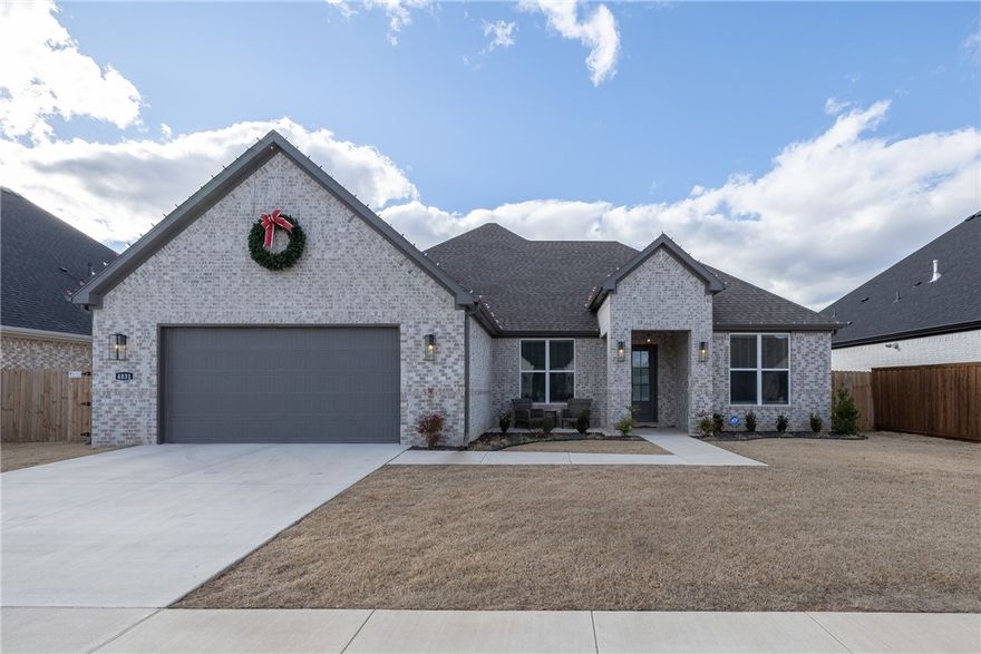 Like brand new, this beautiful open Princeton 3 floor plan was built in 2024 and offers thoughtful upgrades throughout, making it truly move-in ready. This one-level home features three bedrooms, two bathrooms, and a study/flex room designed for everyday functionality. The oversized kitchen island anchors the open living space and is complemented by quartz countertops and modern finishes. Additional highlights include a high-efficiency A/C system, a spacious primary suite with an oversized walk-in shower and a lovely soaking tub, a beautiful gas log fireplace, LED lighting, and 2" blinds throughout. Outdoor living is enhanced by a covered back patio and a welcoming front sitting porch. Fantastic location near Lake Fayetteville, area trails, and the Botanical Gardens, with easy access to both Fayetteville and Springdale. Welcome home!