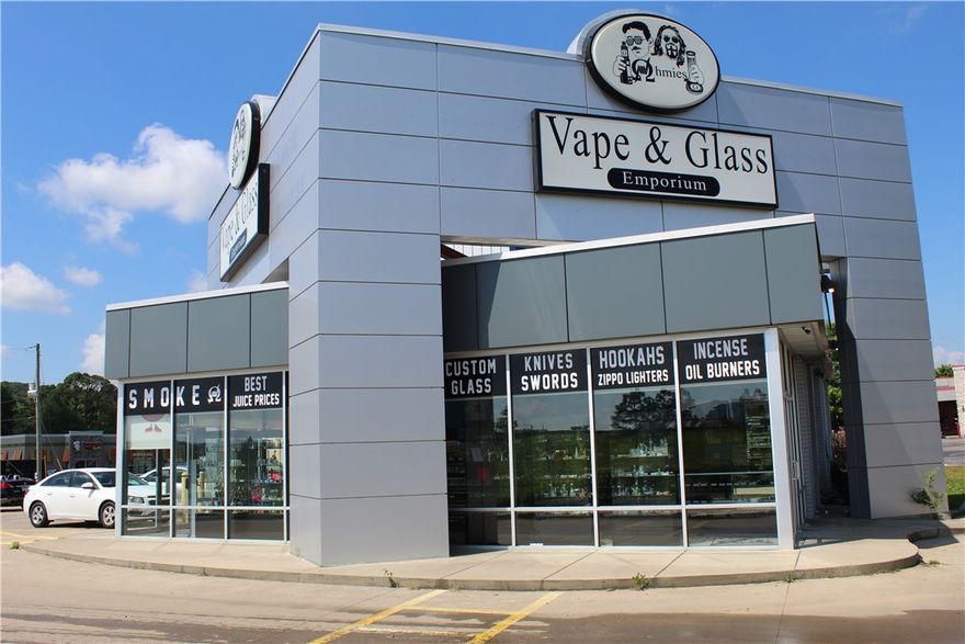 Desirable location near all of Fayetteville's top amenities! Prime location on the corner of I-49 exit 62 and Martin Luther King Jr. Blvd. Retail building features unique design with major signage. Close proximity to University of Arkansas, Baum-Walker Stadium, Fayetteville Historic Square, and Farmington. Open retail space with ample parking. High visibility. Central location.