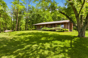 3 bed, 1 1/2 bath on 322.73 acres. New windows in house and roof is only 3 years old. This property is a self sufficient, homesteaders dream. Large garden area to grow the vegetables that you desire. Year after year onion, chives, comfrey, asparagus, strawberries, red raspberries, choke berry, boysenberries, elderberries. There is even an apple tree, 2 pear trees, and 3 fig trees! 2 creeks, 3 ponds, and 4 year-round springs.Relax and go swimming or fishing in the large pond , it's stocked with bass and crappie.15 miles of trails for riding ATVs, UTVs, horses, dirt bikes, or mtn bikes. 30x50' insulated shop with 3 garage doors, one of them is 10' tall. Although the address is Alpena, this property is about 10 miles away from Ponca and the Buffalo National River! Additional land 141753