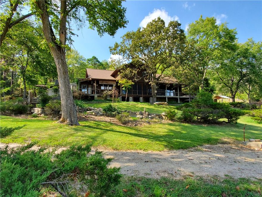 Looking for a homestead property, this is it! Private gated drive to home on 48.47 acres of pasture and some woods. Fenced and cross fenced for livestock. Spring fed pond with pier and a year around creek runs through the property. Home features screen porch off the living room to enjoy the sound of the babbling creek and wildlife. Just off the kitchen is a large green house to extend your growing season with propane heat. Sit in the living room and relax by the fire on those cold winter days. Basement has a workshop area along with a safe room and plenty of room for your canned goods. On the main floor is all your living space with 2 bedrooms sharing a full bath and the master suite with walk in closets and full bath. On the upper level is a convenience apartment for guests or rent out for additional income.