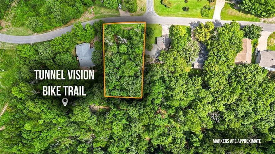 Perc completed as a 2 bedroom but buyer can get updated soil test if desired. Just like your mountain bike, this Bella Vista lot is ready to roll! The location is fantastic — right in the middle of everything you want, including the Tunnel Vision bike trail practically in your backyard and a quick trip to the upcoming chair lift. Check out the drone pictures or take a trip to beautiful Bella Vista to see it in person to take in the views. You’re only 3 minutes from Kingsdale golf, tennis, swimming pools, fitness rooms, and Riordan Hall. Plus, you can hit Bentonville in under 12 minutes and quickly on i49 to head toward Fayetteville or Missouri. If you’re looking for an exciting lot in Bella Vista, this is it.