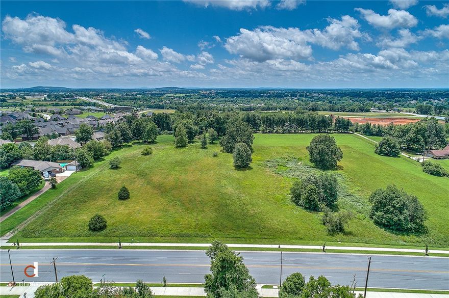 9.5 acres in close proximity to Pinnacle shopping, major retail, restaurants, I-49, Mercy hospital, AMP. Excellent development potential.