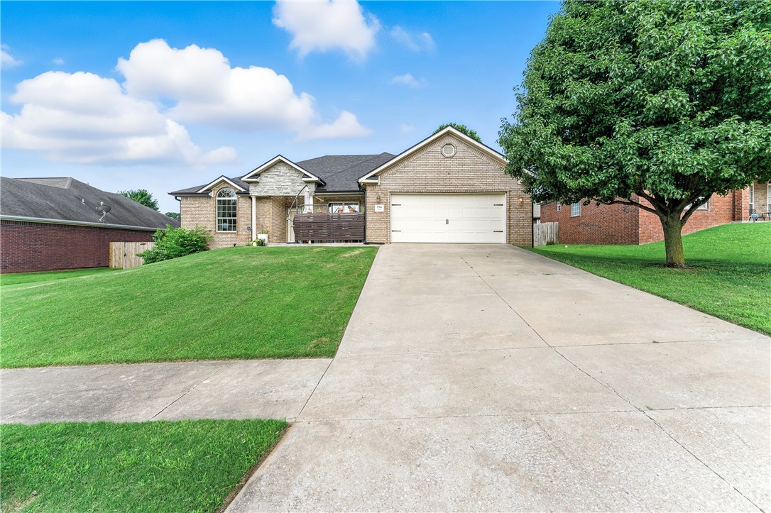 This beautifully updated 4-bedroom, 2-bathroom home offers 1,952 square feet of stylish living space in the sought-after Bentonville School District. With fresh white paint throughout, this home shines with natural light and thoughtful upgrades at every turn. Step outside to enjoy your own private front porch oasis, perfect for morning coffee or evening relaxation. In the back, a large covered and refinished deck provides the ideal space for entertaining or unwinding in privacy. Upgrades include: new flooring and baseboards throughout; fresh paint; udpated kitchen backsplash; new stainless appliances, updated door hardware, hinges, stoppers, and knobs; new toilets/vent covers/outlets/panel. The garage also features a heated and cooled office space (not included in square footage). Additional highlights include a backyard shed for storage and a full Vivint security system with four exterior cameras and smart thermostatāall included! Bentonville School District! Come see this home today!