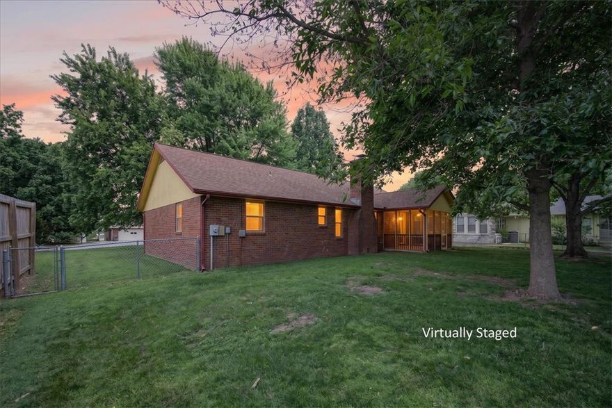 A backyard big enough to leave the bad days behind. New construction simply can’t compete with this 0.63-acre lot. Located in the heart of Lowell, you'll find a lot filled with mature trees, green grass, and endless possibilities.  Whether you’re unwinding on the screened-in back porch, enjoying evenings by your firepit, or tackling projects in the shed this property offers space to truly live. 

Inside, warm wood floors and a cozy fireplace make the living area feel inviting and comfortable — the kind of space that instantly feels like home. With an amazing location and quick access to I-49, you get the best of both worlds: convenience when you need it and a backyard retreat when you don’t.