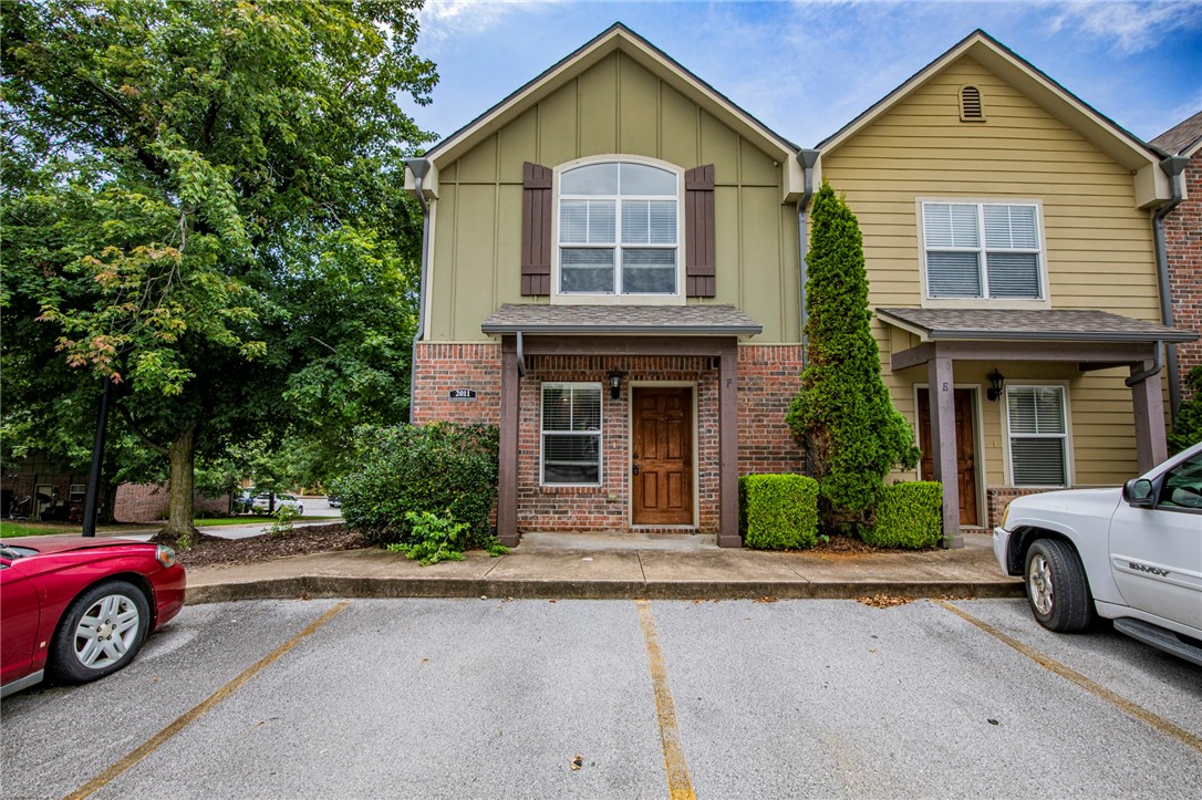 Great 2 bed 2 1/2 bath townhouse in Johnson, just minutes from shopping and restaurants. Hardwood flooring through main living area and lots of crown molding. Living room features electric fire place. Kitchen includes refrigerator and over range microwave. 1/2 bath on main level. Both bedrooms have full baths and large closets. Private patio area. Washer and dryer included. Lawncare included.