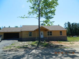 New construction- act now & choose colors. Vaulted ceiling, front porch- minutes from town. Double garage w/ storage above. All electric, diningarea, custom cabinets.