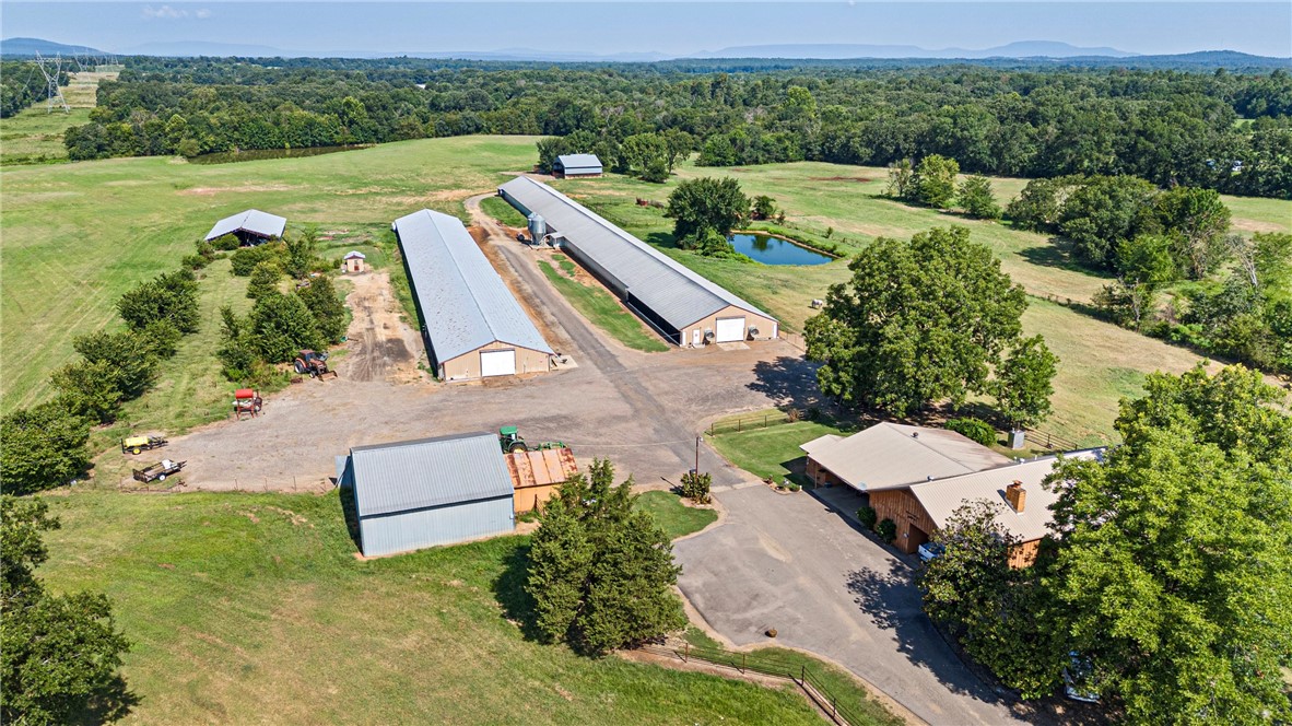 Turn-key Wayne Farms Contracted Poultry Farm on 44± acres in Ola, AR. This income-producing operation includes a beautifully maintained 2,160 sq ft rustic-style home, one active 40āx500ā broiler house under contract with Wayne Farms, and a second 40āx350ā house ideal for hay storage or equipment. A 36āx40ā shop and multiple hay barns add functionality and value. The entire property is fenced and ready for cattle or hay production. Whether youāre a first-time grower or seasoned producer, this well-rounded farm offers the perfect blend of comfort, productivity, and potential.