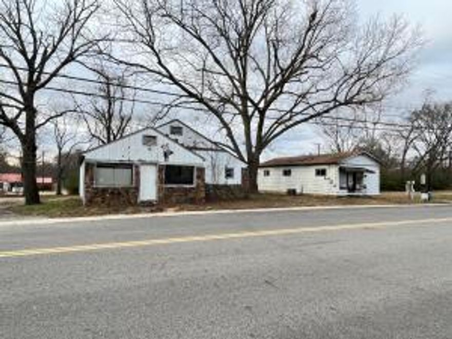 Commercial Property in a HIGH TRAFFIC Area! This property has 2 separate buildings on one lot near downtown Dover right on Highway 7. With some TLC, this place has a lot of potential!