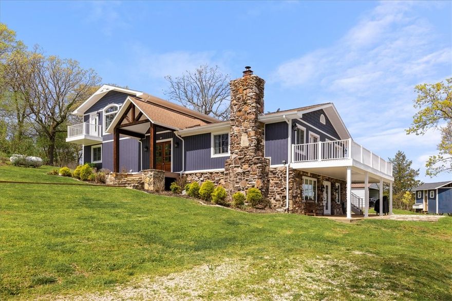 Stunning riverfront retreat on the Kings River with over 800 feet of private frontage. This rare 15.62-acre oasis offers endless possibilities, whether you’re seeking a luxury getaway, income-producing property, or private family compound. The beautifully updated main home features 5 bedrooms, 3.5 baths, and 3,720 sq ft of inviting living space. In addition, two fully remodeled and furnished log cabins (each 620 sq ft) are currently successful short-term rentals. Designed for both comfort & self-sufficiency, the property includes clean well water, a whole-home generator, 15+ mature fruit trees, & abundant wildlife and fish. Enjoy a barn with stables, private shooting range, and even a pickleball court. Fish from your backyard on the pristine Kings River, known for its crystal-clear water and smallmouth bass. Located just 20 minutes to Eureka Springs, 12 to Eagle Rock Marina on Table Rock, and 20 minutes to Dogwood Canyon Nature Park. A once in a lifetime opportunity to own a true Ozark retreat.