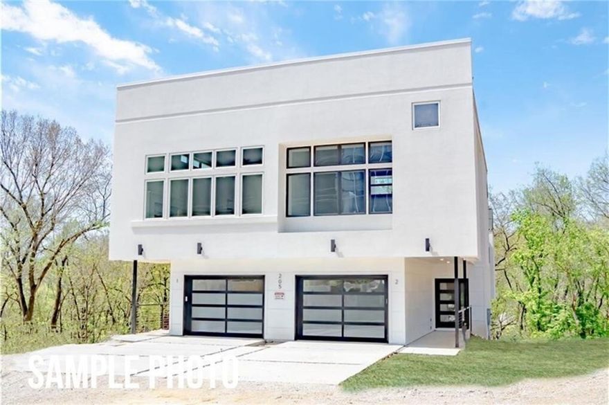 LIVE IN LUXURY! New construction modern townhouse located in the heart of Fayetteville - near U of A, Fayetteville square, restaurants, trails, and so much more! One of a kind 3 level townhome with 700 sq ft rooftop living and garage door opening to the main living area, large windows letting in abundance of natural light, sound system throughout the entire home, and high end finishes to include stainless steel appliances, & modern plumbing and light fixtures. Retreat to the master suite - luxurious walk in shower with dual shower heads, dual sinks, spacious walk-in closet, and so much more. Enjoy the gorgeous views of the wooded scenery from the spacious patio. You won’t want to miss out!