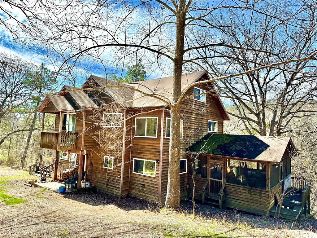 Steep and bumpy please bring 4x4 or SUV
Discover the potential of this spacious home nestled on 4.405 acres of serene woods and wildlife, just a stone's throw from the vibrant community of Eureka Springs. This property offers a perfect blend of privacy and natural beauty, making it an ideal retreat for nature lovers.
Step inside to find a layout brimming with possibilities. The home features a cozy screened porch, perfect for enjoying morning coffee evening sounds, and a spacious deck that invites outdoor entertaining amidst the peaceful surroundings.
With ample space for customization, you can turn this fixer-upper into your dream home, all while enjoying the abundant wildlife that calls this property home. Whether you're looking for a weekend getaway, a full-time residence, or an investment opportunity, this property is a canvas waiting for your vision. Community type well access. Private road easement
Donāt miss your chance to own a slice of paradise near Eureka Springsāschedule your showing today!