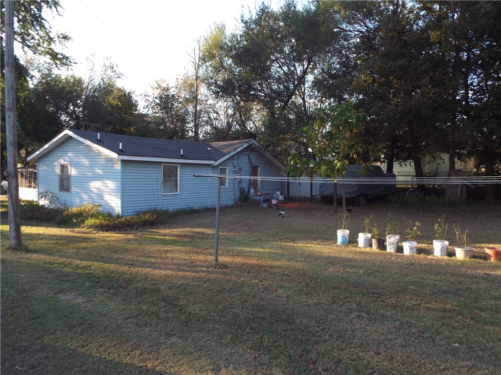 Fixer upper on a large corner lot , 3 bed 2 bath