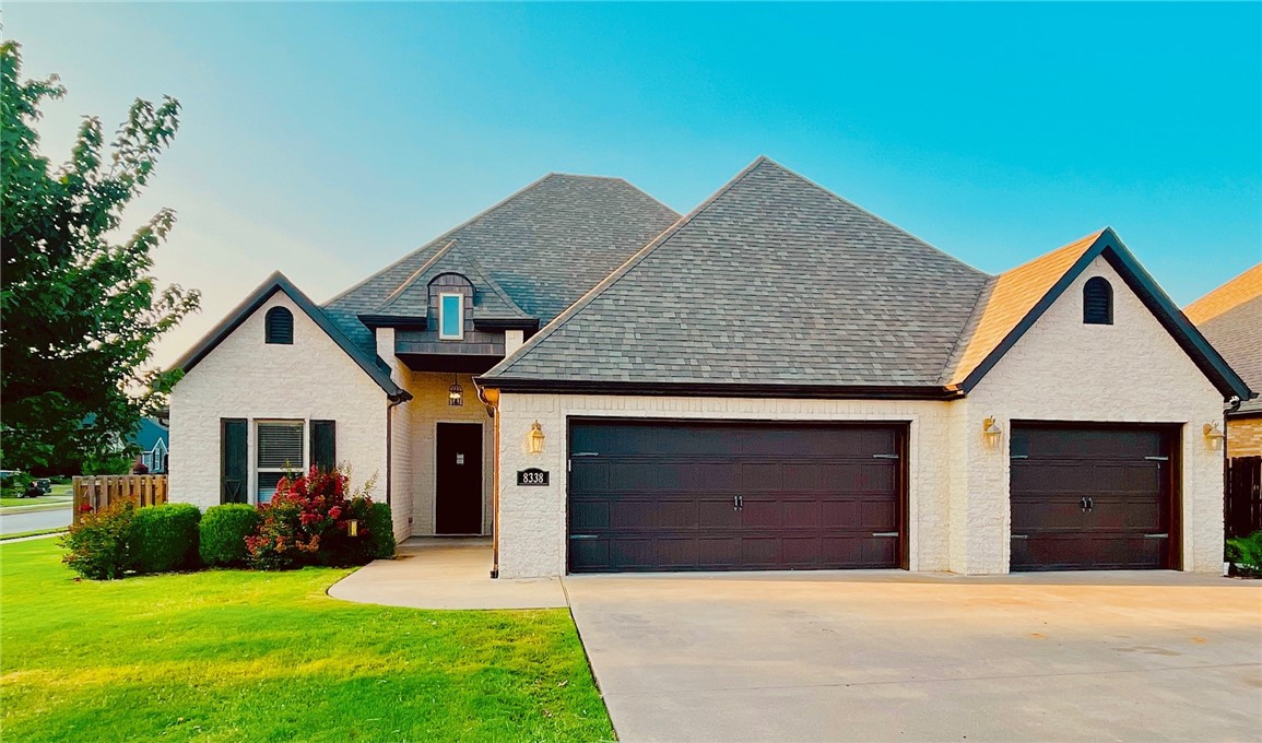 Welcome home to one of Springdale's most sought-after subdivisions. This beautiful home sits on an oversized corner lot and features 5 bedrooms and 4 full bathrooms. This split floor plan has the master suite and 3 secondary bedrooms downstairs with an additional 2 full bathrooms. It offers the wide-open feel in your most frequented living spaces as the kitchen, eat-in area and living room all open up to each other. The second level boasts a large bedroom, full bathroom and bonus room. The roof, downstairs HVAC, paint and hardwood flooring are new within the last 3 years. The home is in very close proximity to Har-Ber High, Hellstern Middle and Young Elementary schools and Tuscany has a great clubhouse and community pool. Only 9 homes have sold in this highly desirable neighborhood in the last year. Here is your opportunity to secure this coveted location! Please see the MLS Documents to view the full list of upgrades.