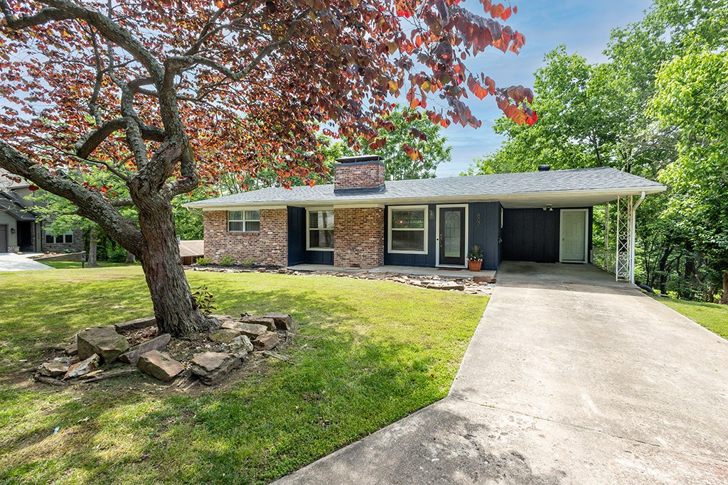 Tucked in at the base of Mt Sequoyah and just a few minutes walk, bike or drive to downtown, Dickson St, the UofA and Razorback sports, world class performing arts venues, restaurants and food trucks, coffee shops and cocktail bars, sits a home that puts you close to it all. This well-maintained home has been updated and improved in recent years, including some fun stuff like the complete kitchen remodel, but mostly the expensive stuff you never want to have to think about. New cement fiberboard siding, all new windows, refinished original hardwoods, new roof ... high dollar projects that you will pretty much never have to think about. The lower level has a huge greatroom, second full kitchen, two beds and a full bath, and with access from both the main level and from outside, youāve got options. The current owner lived upstairs and Airbnbād the down, but it's perfect as an in-law suite, housing for your incoming UA students, or just as part of a great house with a party kitchen. Who wouldn't want a party kitchen??