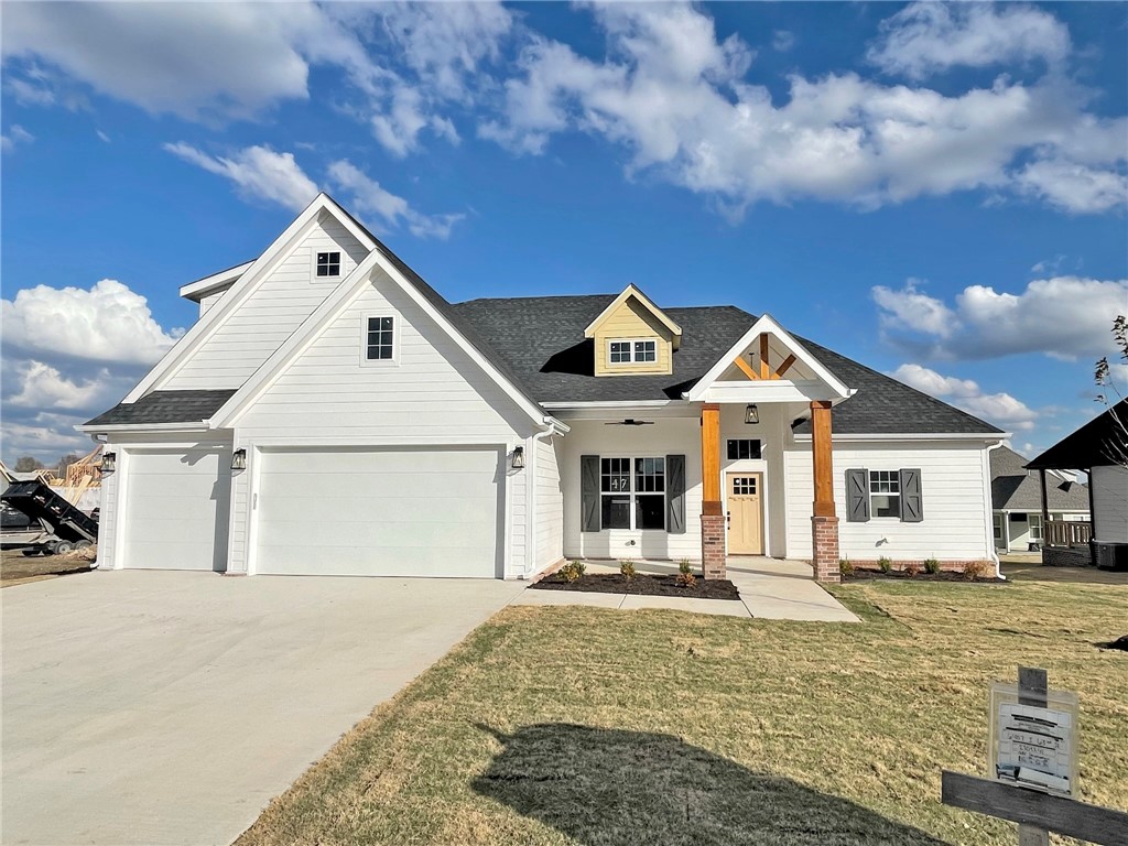 New construction home in desirable area in SW Rogers! It features 4 bedrooms/3.5 baths/bonus room/3 car garage. Downstairs has open concept in the living and kitchen area. Kitchen is equipped with gas cook top, built-in oven and microwave, large island, pantry, and eat-in dining. Primary is on main level with a spacious bath and closet. Study and half bath also sit downstairs. Upstairs has bedrooms 2-4, 2 full baths, and the bonus room.