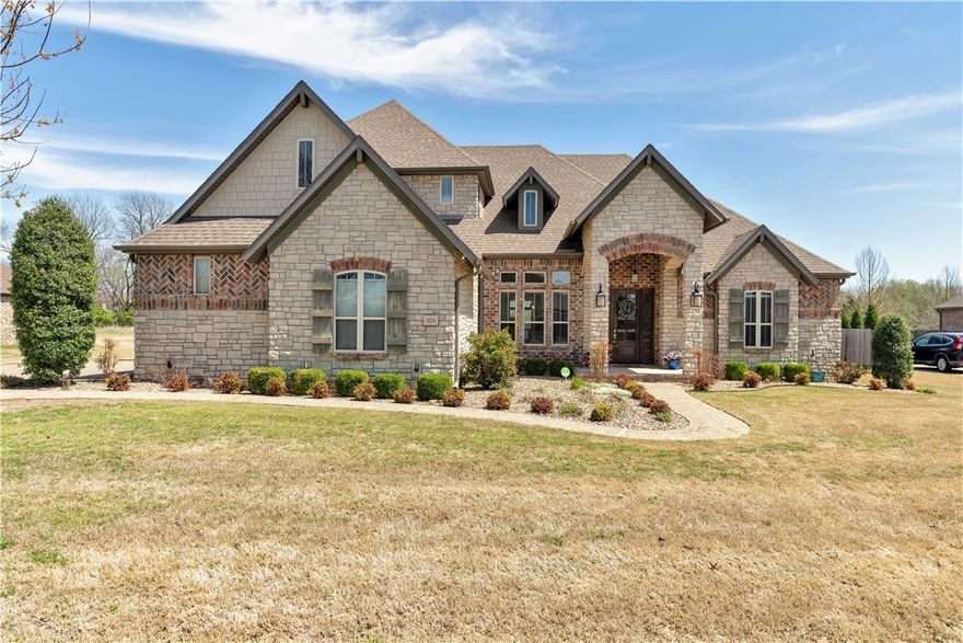 Welcome to 3174 Warbler! Your new home is located near the end of a quiet street & offers close proximity to I49 & bike trails ( NWA Greenway entrance is 100 ft away).  Your back yard  with heated pool ( and plenty of room for baseball practice) overlooks a Nature Preserve.  5 bedrooms & 3.5 baths allow for easy family living. Primary suite & 2 bedrooms are on the main level along with the open living, dining,  kitchen, & your office/library.  The cook's kitchen has  a large work island, a pantry, & upgraded appliances including a gas cooktop. Your office is a light filled work space.  Upstairs you have 2 more bedrooms with an adjoining bath and the playroom.   The .56 acre lot offers plenty of room to roam with irrigated garden beds, 38'x16' heated pool with 6 ft tanning ledge & water feature.   Life is good at 3174 Warbler! Seller prefers a closing date of June 9,2025 or later.