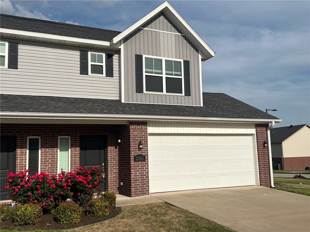 3 BED/2.5 BATH townhome in prime Rogers location with convenient access to major shopping centers,the city center, and I49. Don’t miss the chance to own a unit in this multi-family fourplex. The property includes a private 2-car garage, refrigerator, washer and dryer, granite countertops, walk-in closets and pantry, and ceiling fans throughout. It's an excellent opportunity for first-time homebuyers, corporate commuters, or investors. Interior photos shown are representative of the unit's style, features and layout. Individual unit fixtures and finishes may vary slightly.