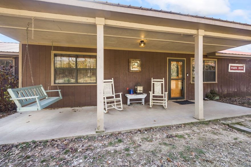 BACK ON THE MARKET,  at no fault of the seller. Just 7 miles from Fayetteville, this 1,664 sq/ft. farmhouse sits on a picturesque 5.65  acres in the community of Goshen, you can enjoy fishing at the iconic twin bridges, nearby equine facilities and local community events and farmers market. Built in 1989, the interior features heart pine floors, stained-concrete countertops & luxuriously updated bathrooms. The family room has a natural stone flue & wood stove for secondary heat. From the dining area you step in the sunroom that leads to the back porch & stone patio, curated flower beds & pergola. Once an antique shop, an additional rustic 564SF cabin is heated/cooled and would make a perfect bunk room, Airbnb, or office! A homesteaders dream, the property has a 9000sf irrigated garden, a smaller hobby garden, garden shed and a detached shop. Sellers own the adjacent 41.3 Acres parcel and home 19849 Pug Gayer Road MLS#1296630 and will consider offers including both properties together.