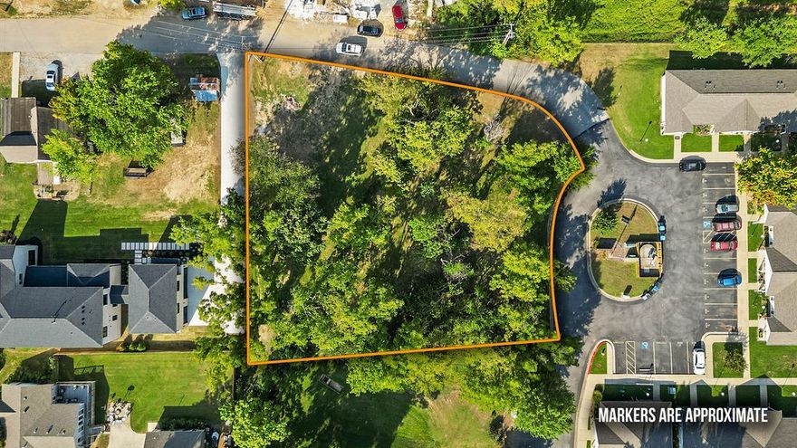 Serene park like setting with a great location. Nice huge lot <1 mile to Downtown Center, AWSOM, Crystal Bridges, New Walmart Campus and all Downtown Bentonville has to offer. Public utilities at 2nd St. Build your dream home.