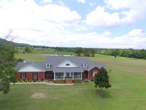 WOW!!! A Dream Come True! Beautiful home on almost 29 acres of Spectacular Land. You will love this Wonderfully designed home, Remarkable fit and finish! Featuring open floor plan lots of windows and french doors in almost every room for great natural light. Beautiful master suit with walk in closet and luxurious master bath. 3 bedroom 2.5 bath with office. Oversize two car garage and 30'/50' shop with two overhead doors plumbed for shop air, Wired with plenty of electrical outs and sink there to clean up when you get done with your project for the day.